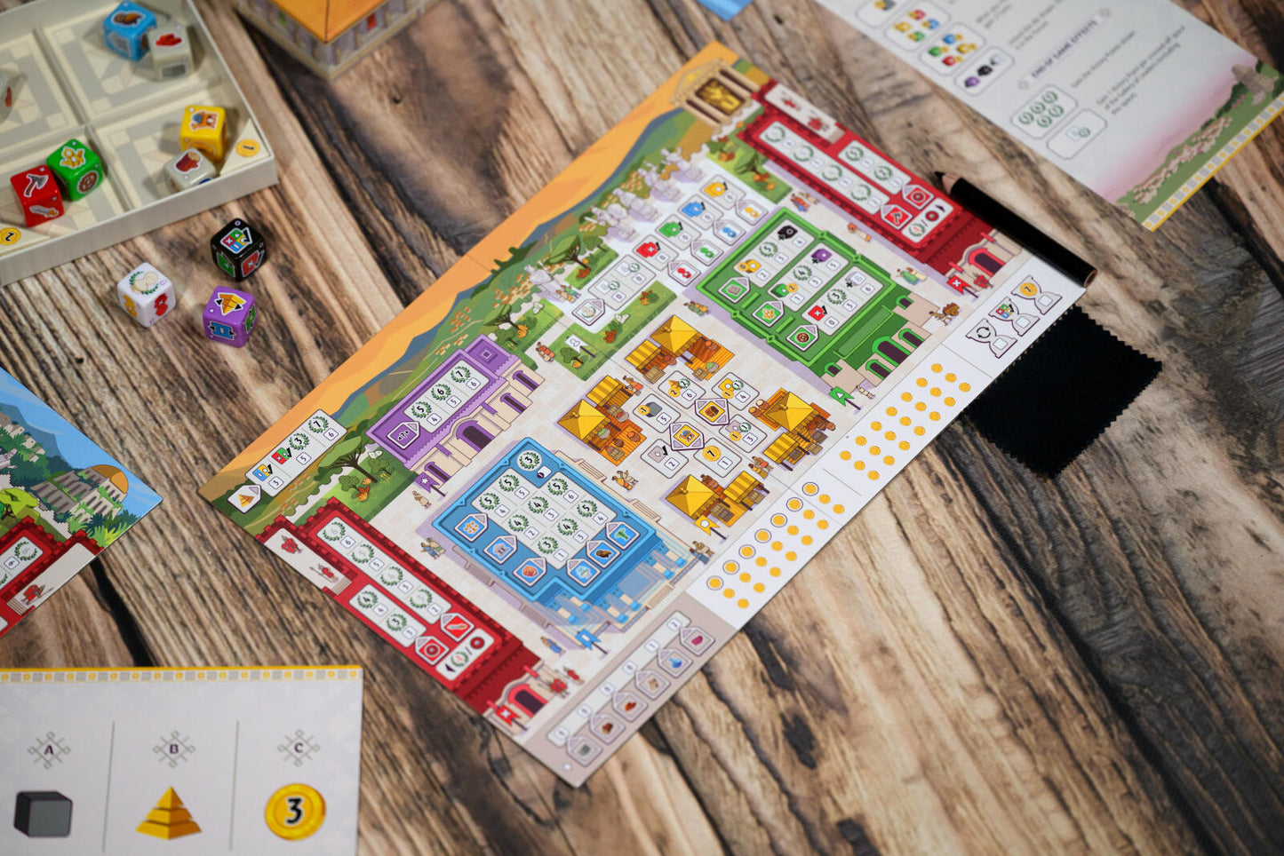Board game with colorful tiles and dice on a wooden surface