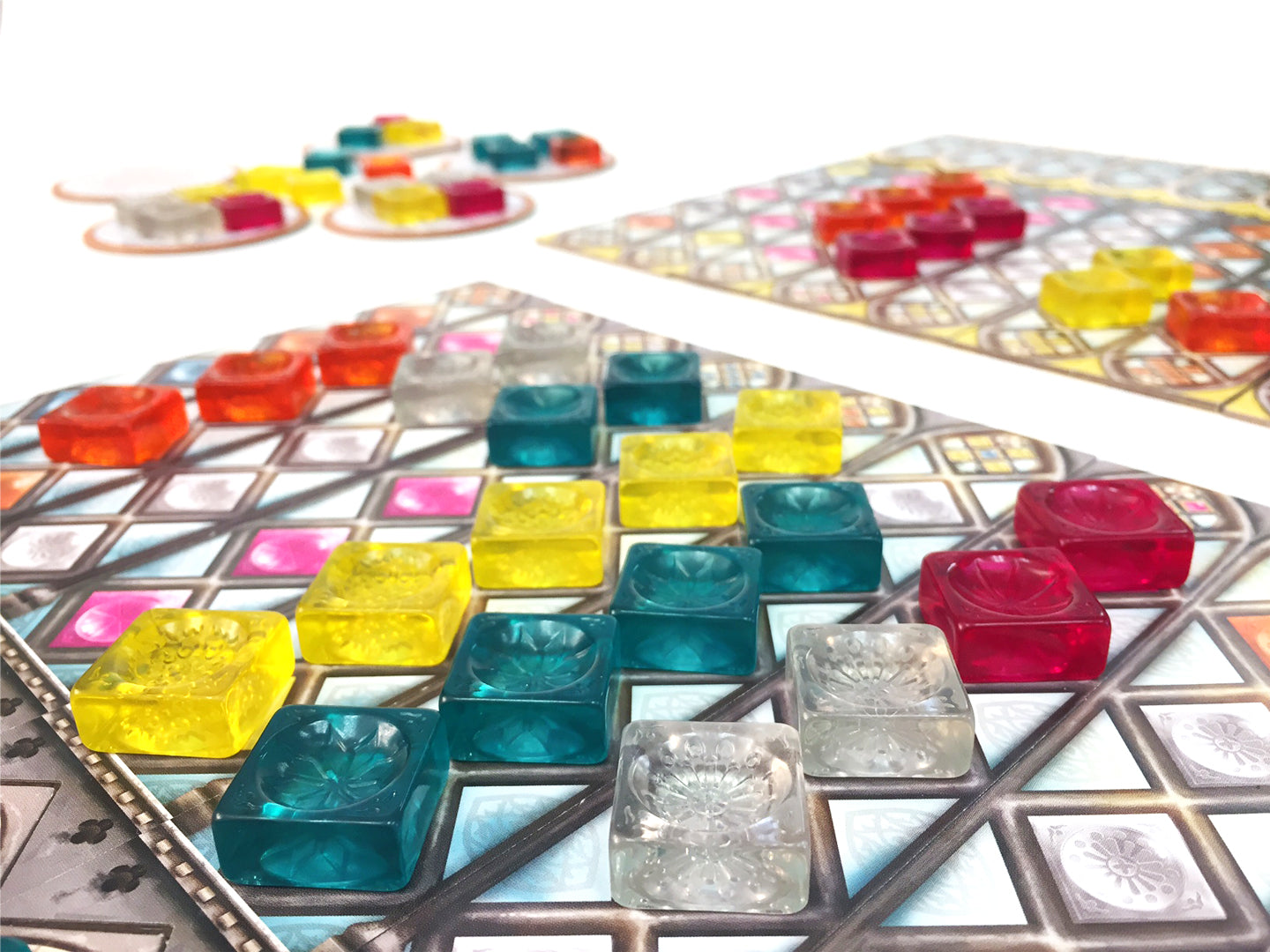 Board game with colorful game pieces on a white background