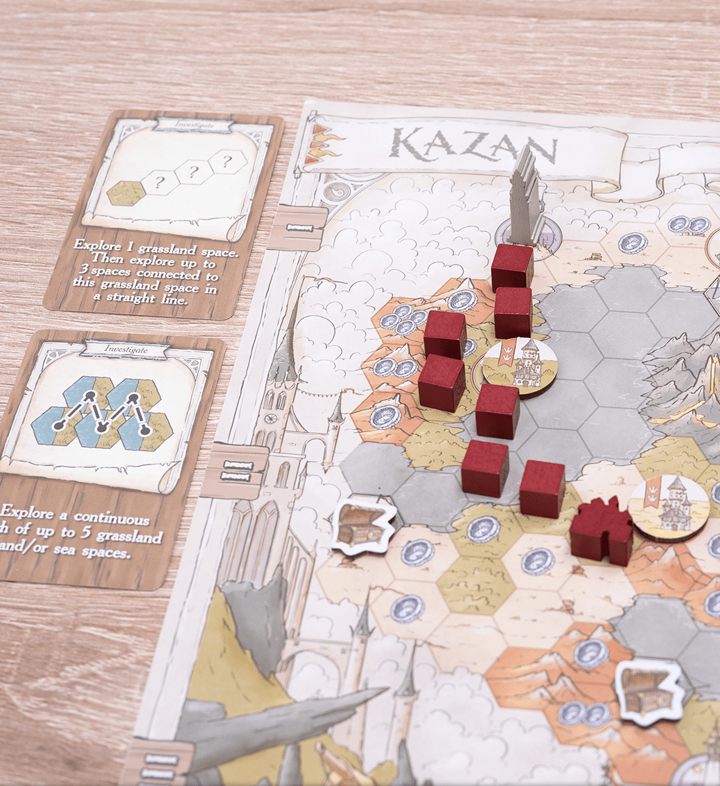 Board game setup with hexagonal tiles and player tokens on a 'Kazan' map