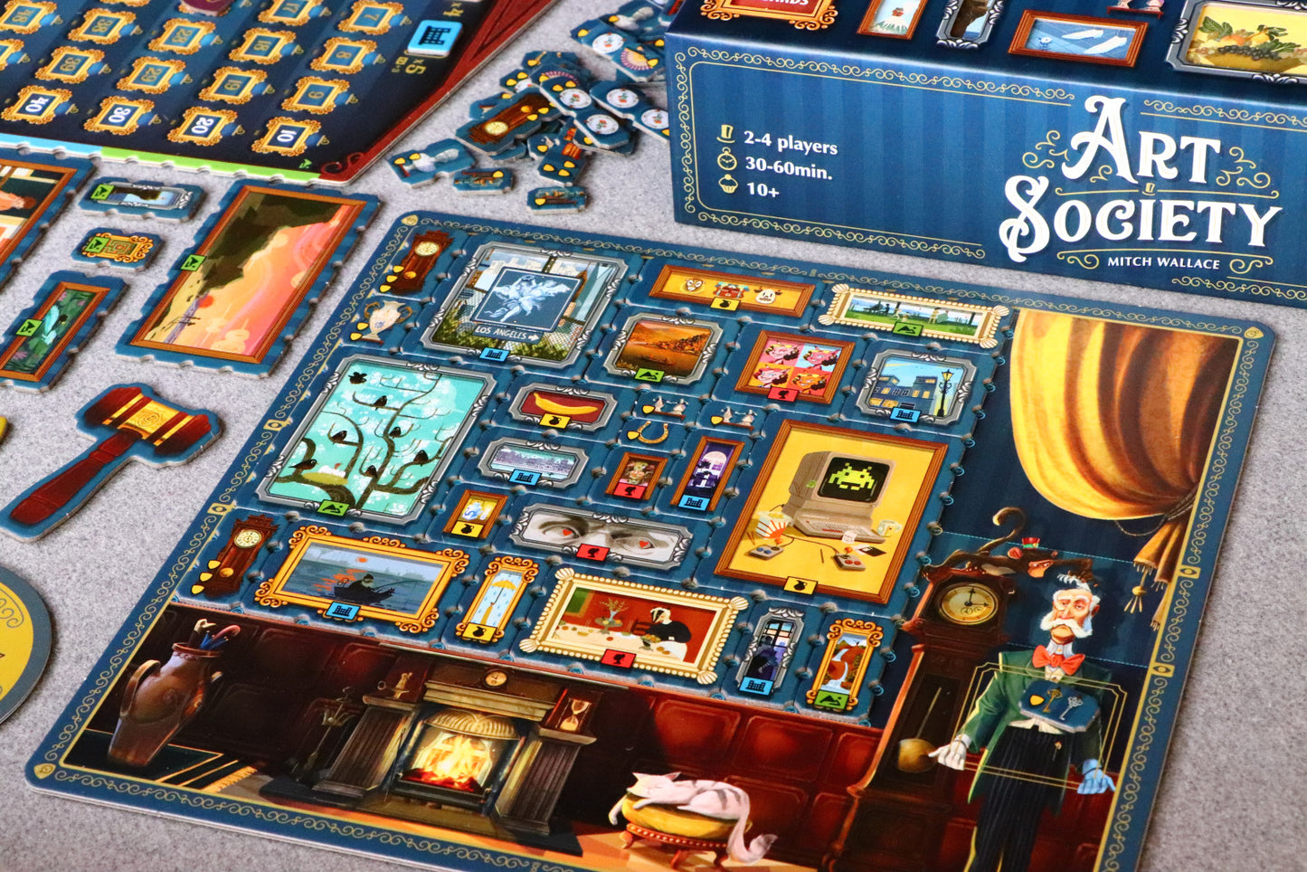 Board game 'Art of Society' with various game pieces and cards on a table.