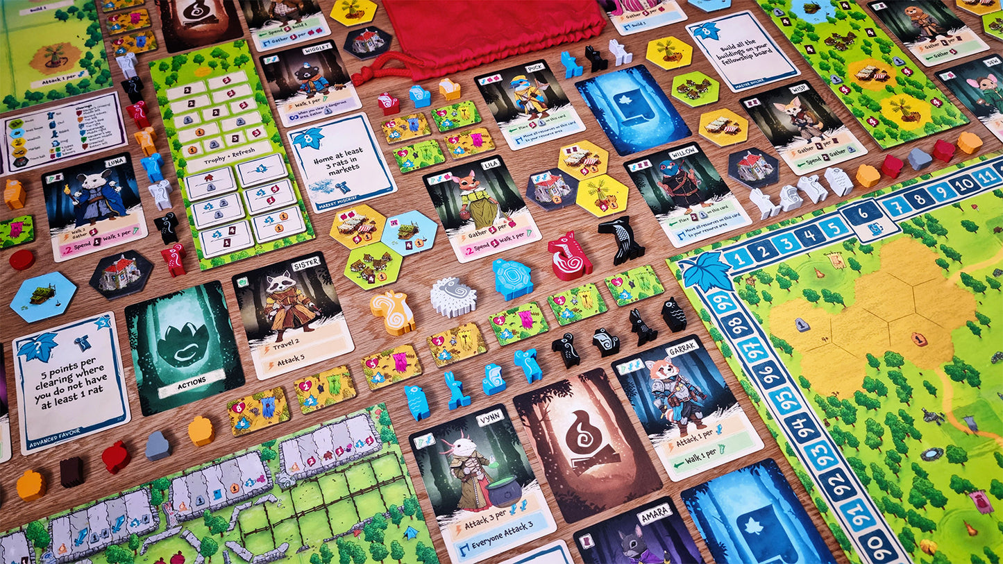 Board game Ember leaf with various cards and pieces on a wooden board