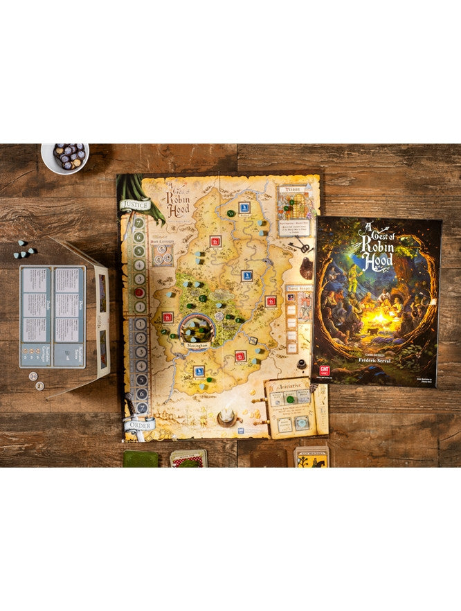Board game set with map and character cards on a wooden surface