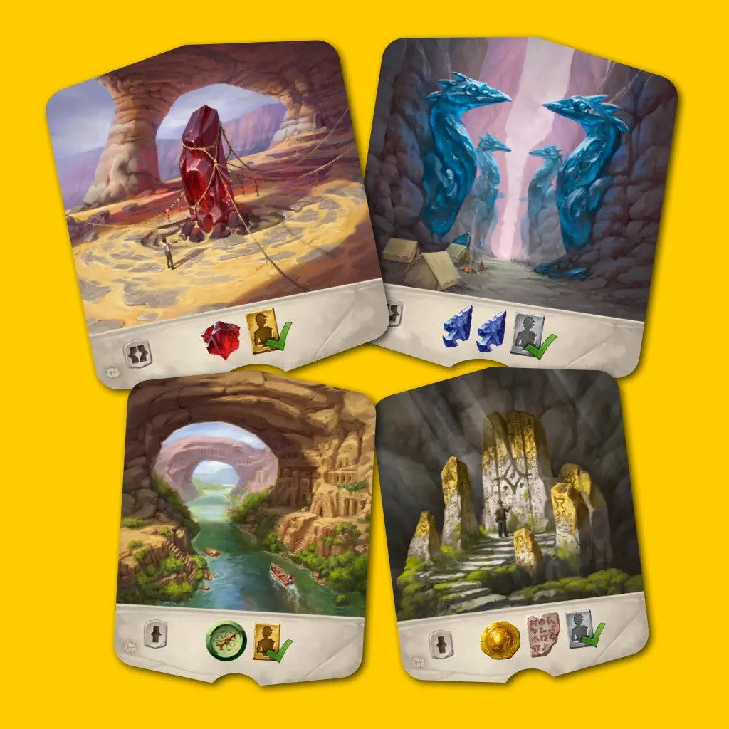 Lost ruins of Arnak Adventure Chest Four fantasy-themed playing cards on a yellow background