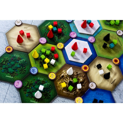 Dominant Species Board game with hexagonal tiles representing different terrains and player pieces.