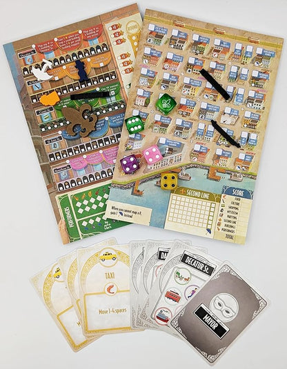 Board game components laid out on a white background, including two illustrated game boards, several dice, black tokens, and multiple player cards with vehicle-themed illustrations.