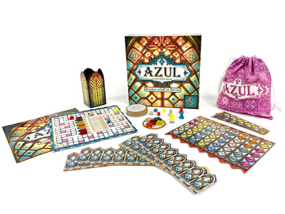 Azul board game components including cards, pieces, and box on a white background