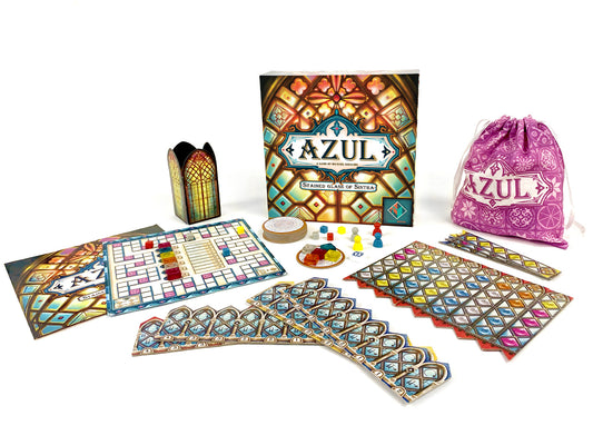 Azul board game components including cards, pieces, and box on a white background