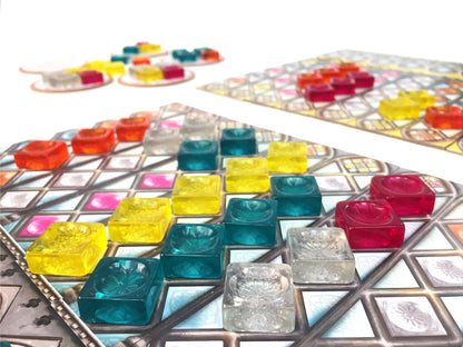 Board game with colorful game pieces on a white background