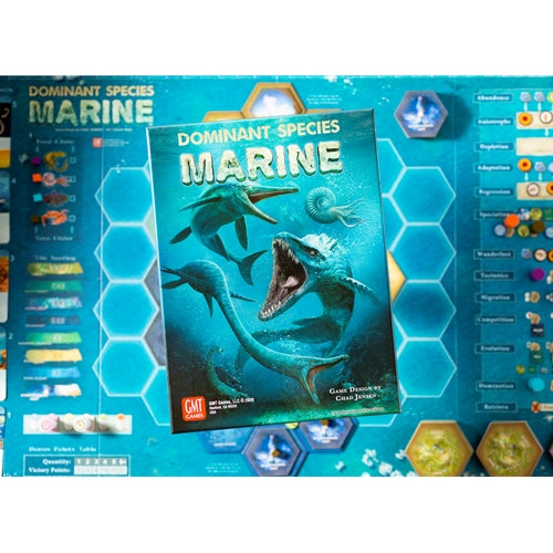 Board game box for 'Dominant Species Marine' with marine life illustration on a blue background