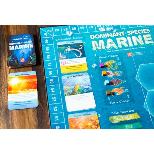 Dominant Species Marine Board game set with 'Dominant Species Marine' on a wooden surface