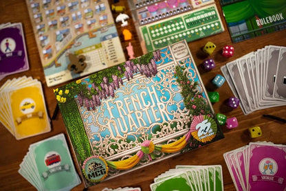 Board game 'French Quarter' with cards and dice on a wooden table