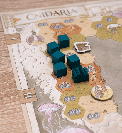 Board game piece on a map with 'Cnidaria' branding