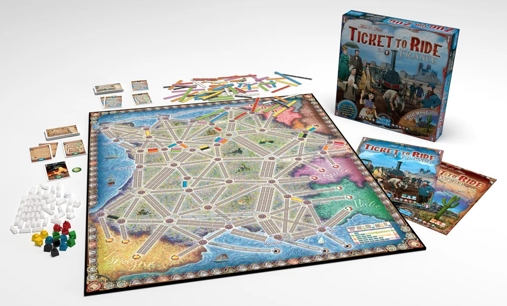 Board game 'Ticket to Ride' with components on a white background