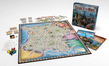 Board game 'Ticket to Ride' with components on a white background