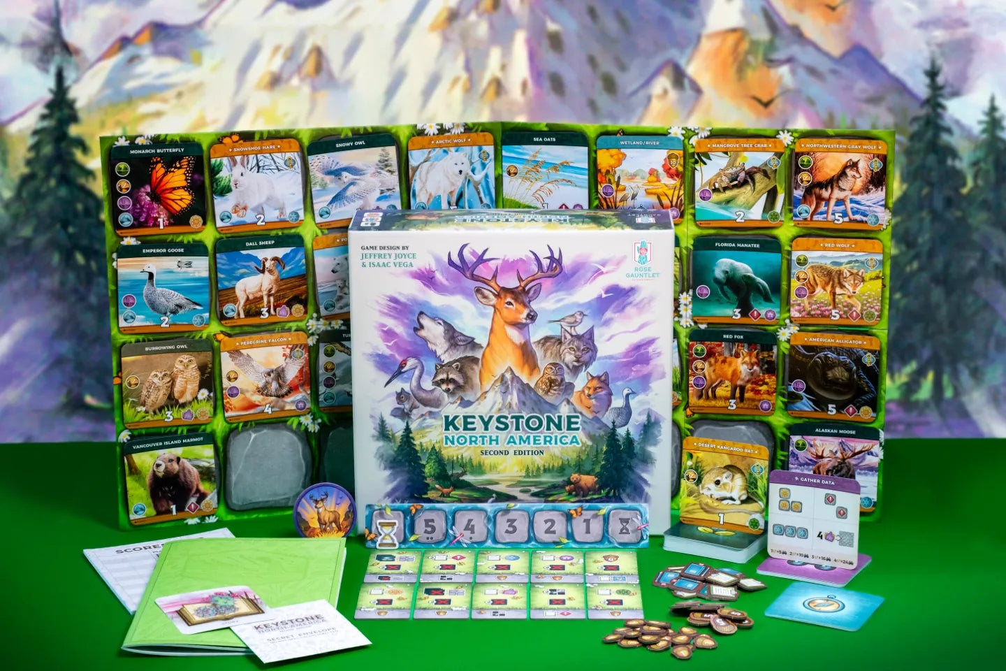 Keystone North America Board Game  set with cards and pieces on a green surface, featuring a nature-themed design.