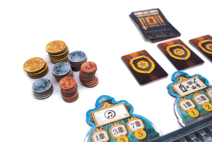 Board game components including cards and tokens on a white background