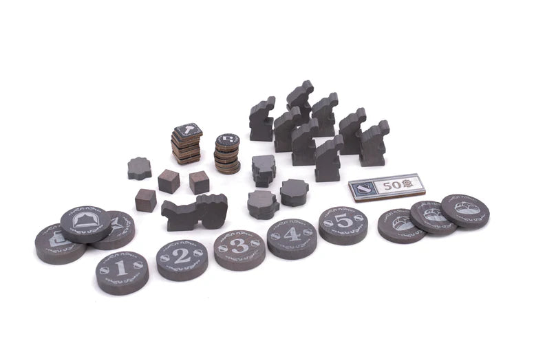 Collection of gray game pieces on a white background