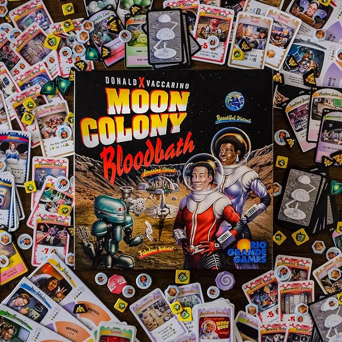 Collection of trading cards with a prominent 'Moon Colony Bloodbath' card in the center.