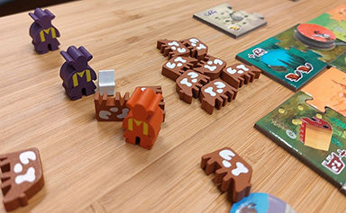 Moon River board game meeples.