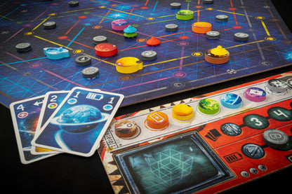 Orbit Board game with colorful pieces and cards on a dark surface