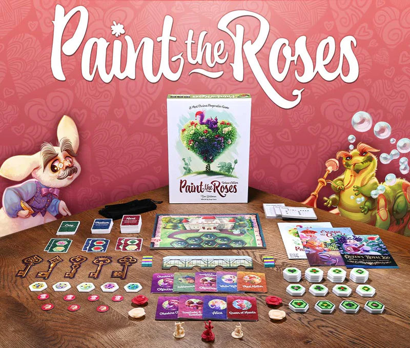 Paint the Roses Board game set with 'Paint the Roses' packaging on a wooden table against a pink background.