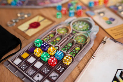 Board game with dice and game pieces on a wooden table
