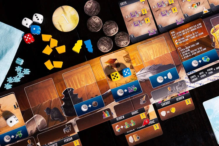 Scholars of the South Tigris Board game components including cards, dice, and game pieces on a dark surface
