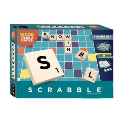 Scrabble board game box with wooden tiles and racks on a white background