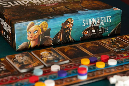 Shipwrights North Sea Board game box for 'Shipwrights of the World Sea' with game pieces on a dark surface