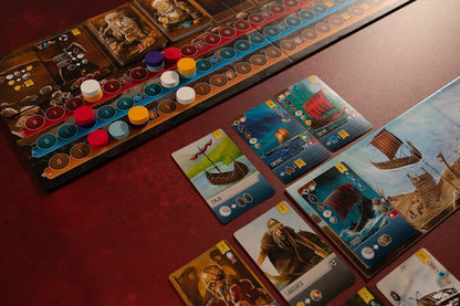 Shipwrights North Sea Board game with cards and dice on a wooden table