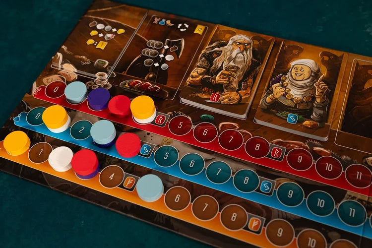 Shipwrights North Sea Close-up of a board game with cards and colorful markers on a dark surface