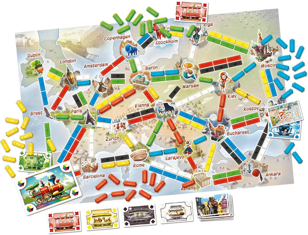 Board game with colorful train tracks and city cards on a map background