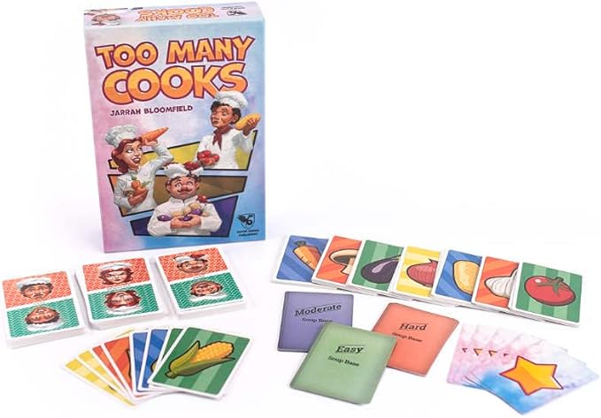 Board game 'Too Many Cooks' with cards and box on a white background
