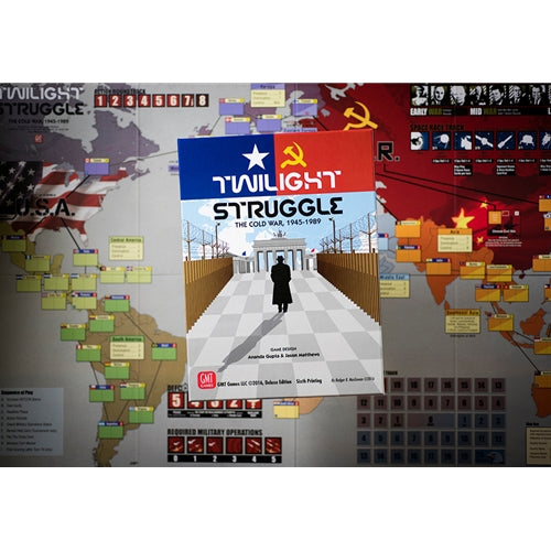 Twilight Struggle board game box with a map and game pieces in the background