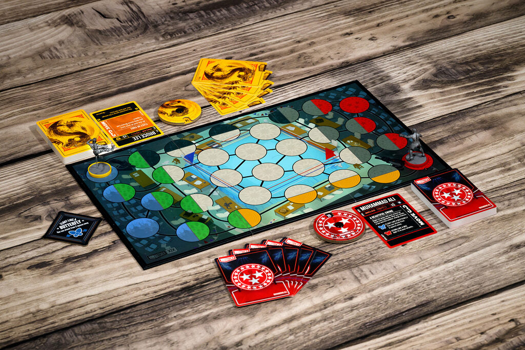Board game with pieces and cards on a wooden surface