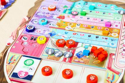 Coming of Age Colorful board game with various tokens and cards on a wooden surface