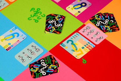 dnup Colorful card game with question marks and 'doh!' text on a multicolored background
