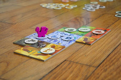 Board game pieces on a wooden floor