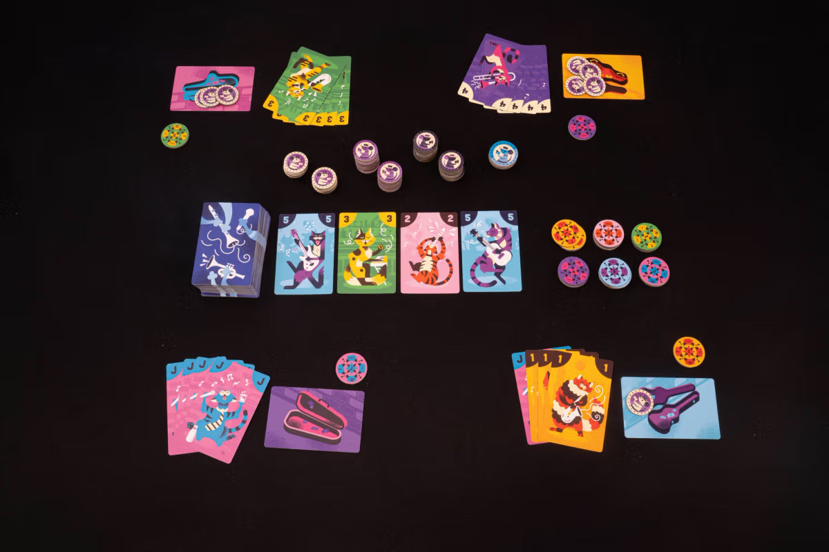 Colorful board game components on a black background