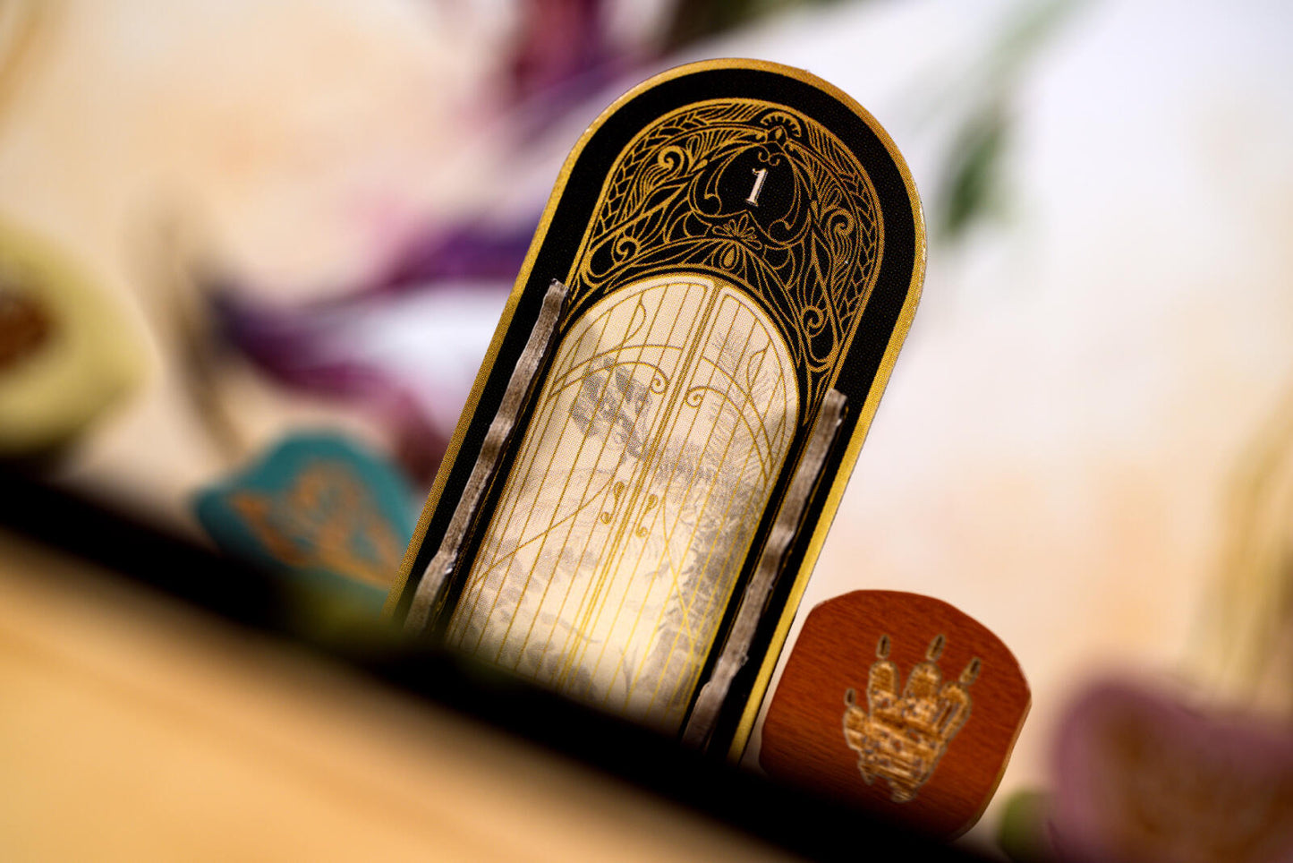 Close-up of a decorative object with intricate designs on a blurred background