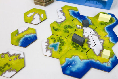 Board game with hexagonal tiles on a white surface