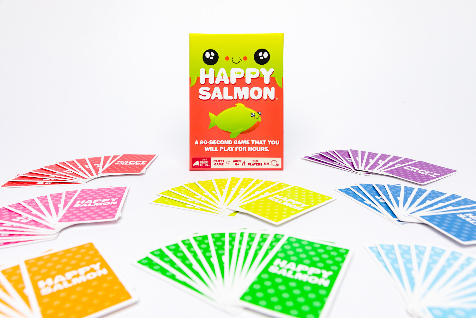 Colorful card game 'Happy Salmon' with cards and packaging on a white background