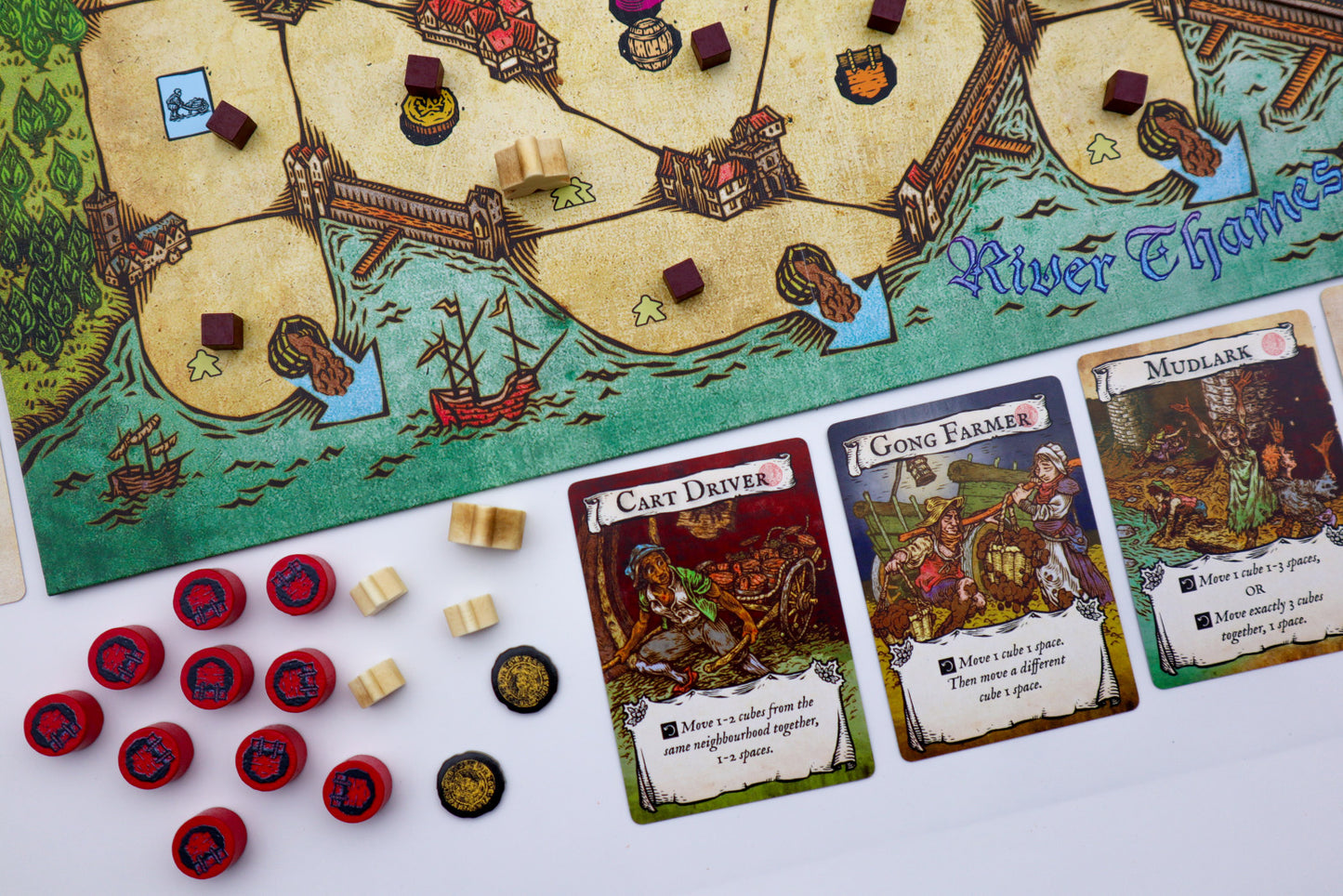 Board game with map, cards, and game pieces on a table