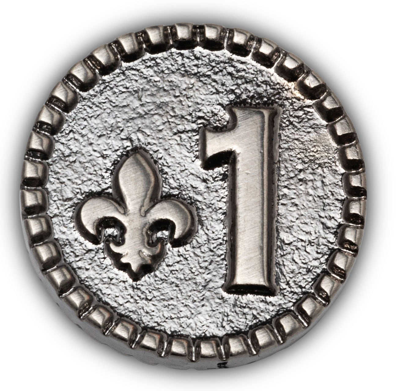 Silver circular object with number '1' and fleur-de-lis design on a white background