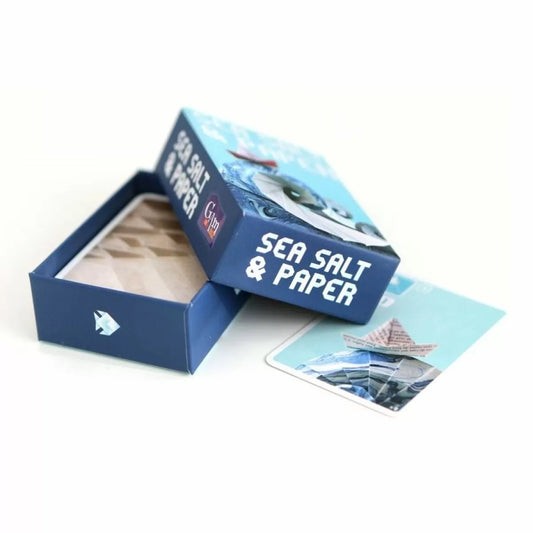 Open box of Sea Salt & Paper products on a white background
