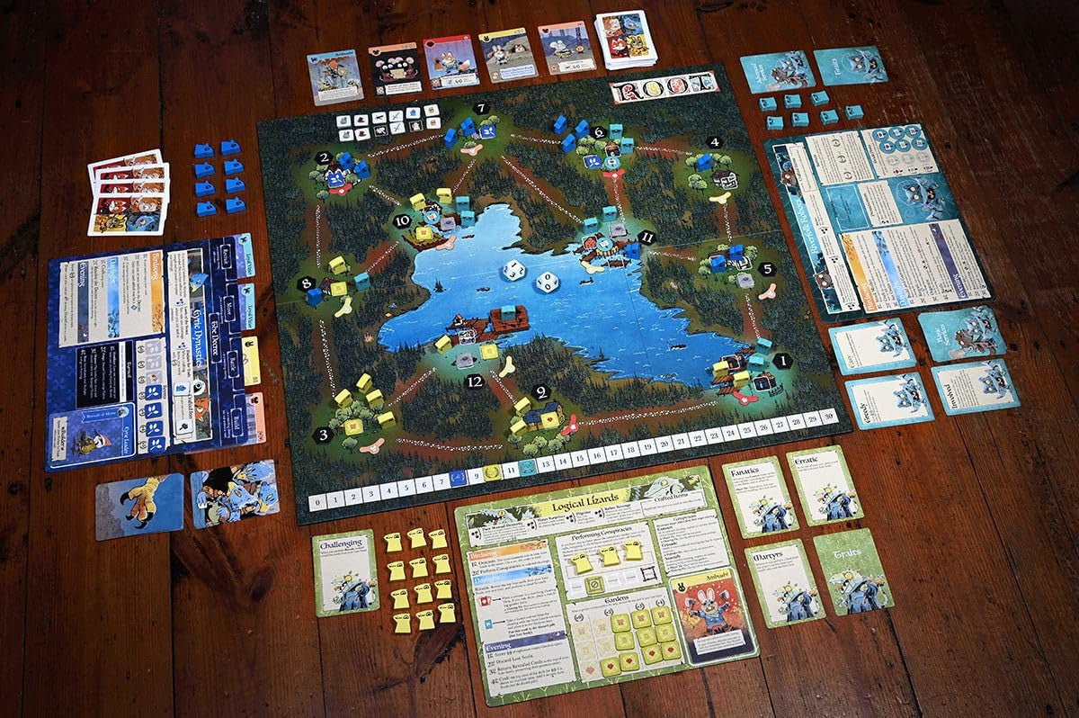 Root clockwork 2 Board game with various cards and pieces on a wooden floor