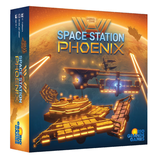 Board game box for 'Space Station Phoenix' with space station illustration on a blue and orange background.