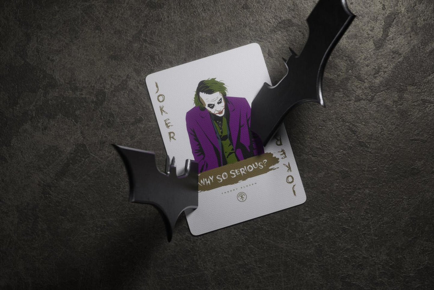 Batman playing cards of the Joker on a dark textured background
