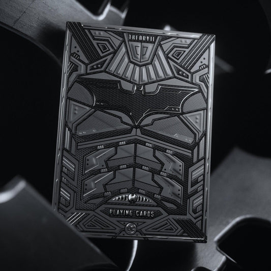 Batman playing cards of Black and gray playing card box with geometric design on a dark background