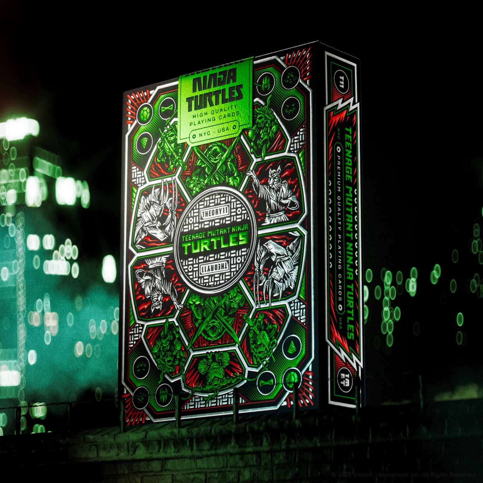 Ninja Turtles playing card box with cityscape background
